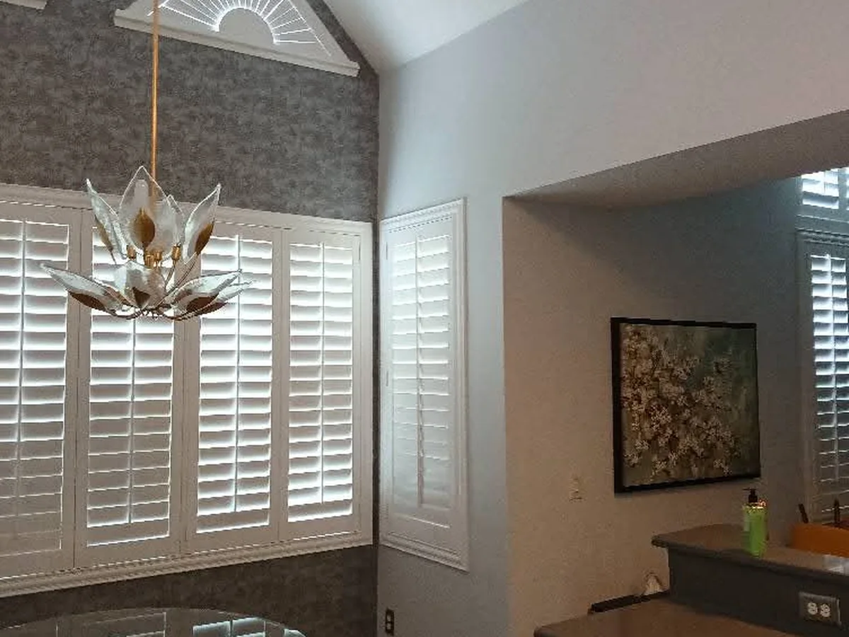 Dining area with a freshly painted vaulted ceiling