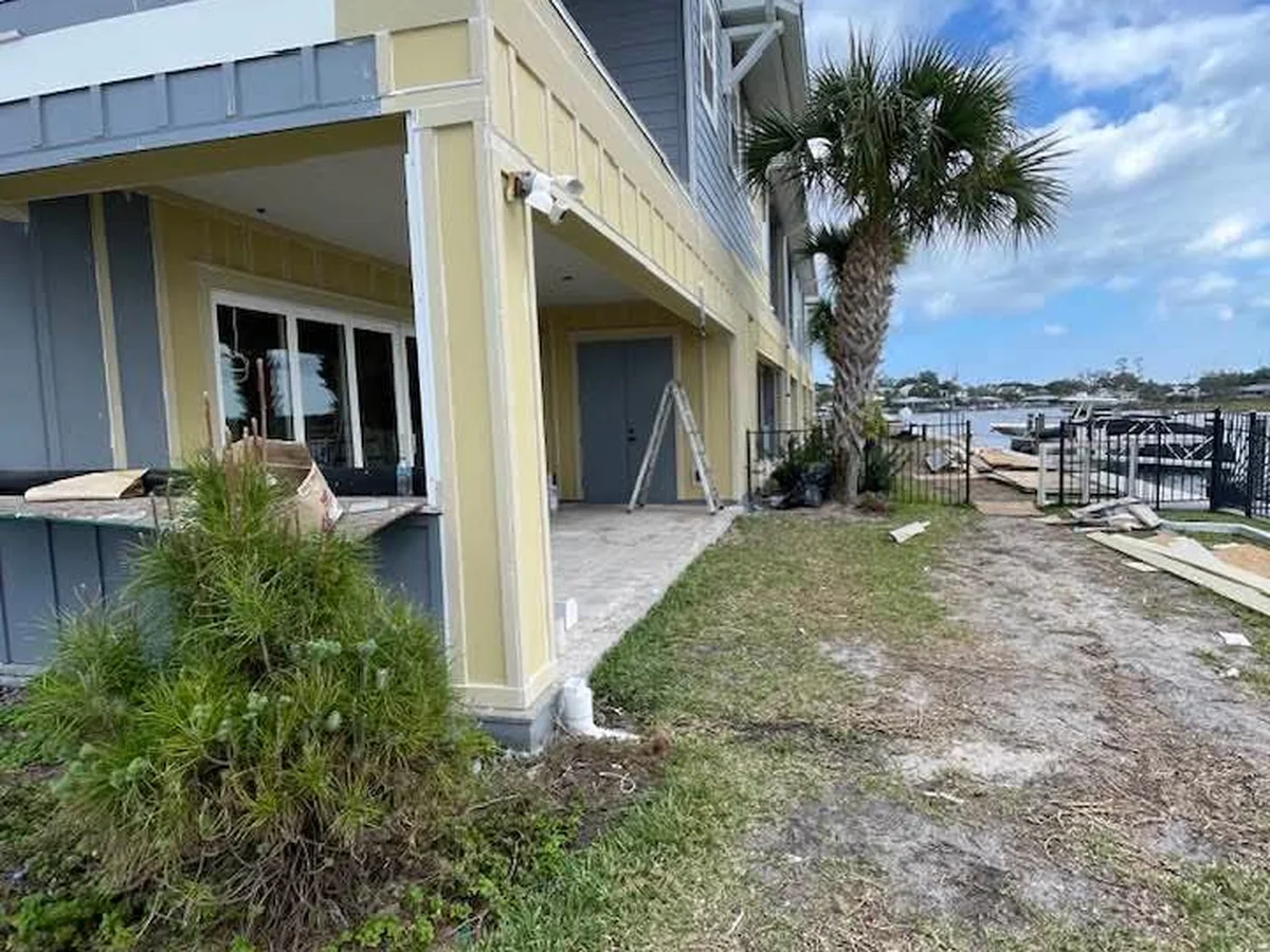 Two-story exterior repaint in progress