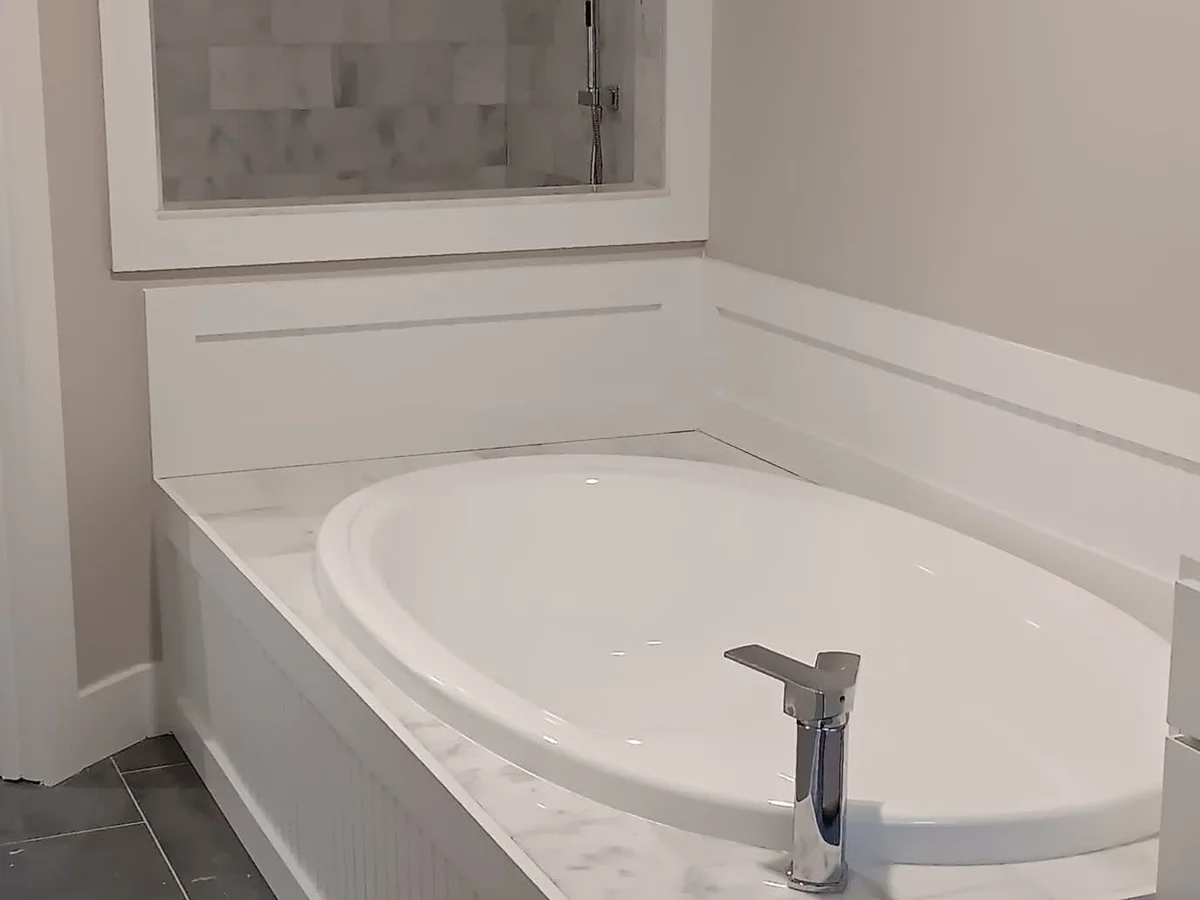 Bathroom walls and tub surround finished clean
